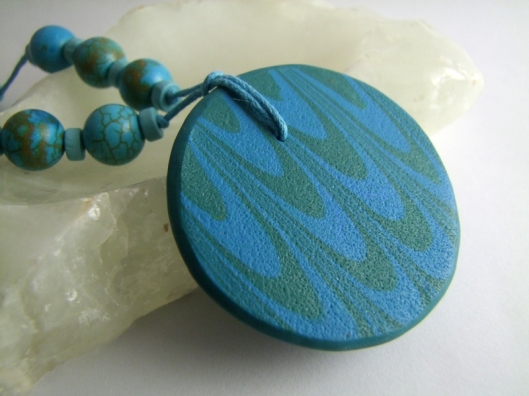 Back of teal pendant