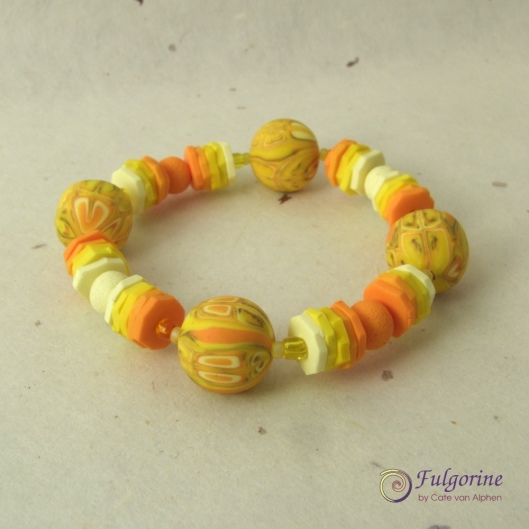 Yellow bead bracelet by Cate van Alphen