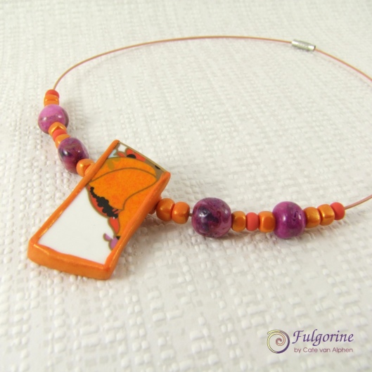 Orange shard necklace by Cate van Alphen