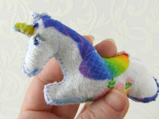 Tiny unicorn plushie